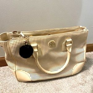 Tory Burch purse. Beautiful color and very clean inside
